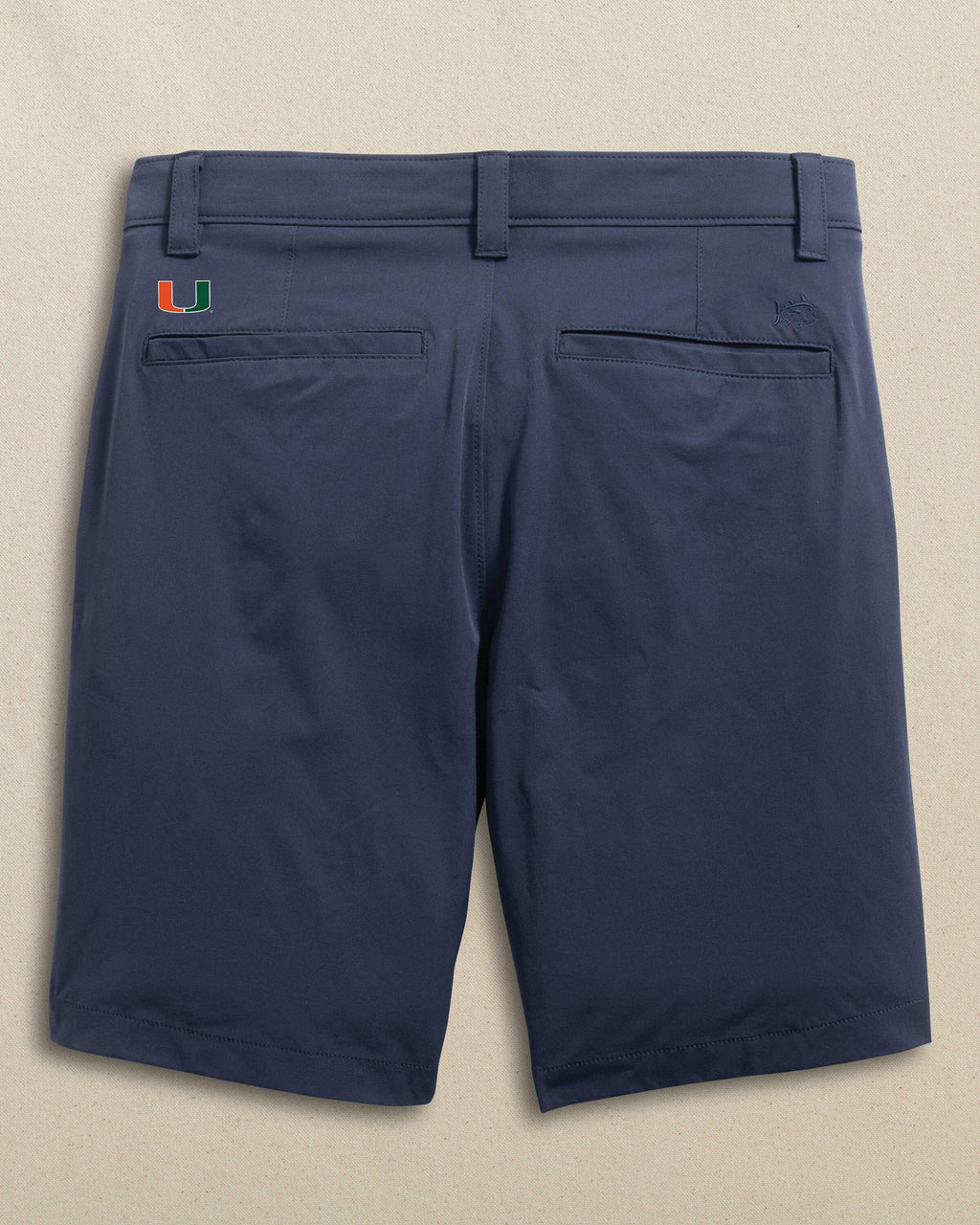The back view of the Southern Tide Miami Hurricanes brrr°®-die 8" Performance Short by Southern Tide - True Navy