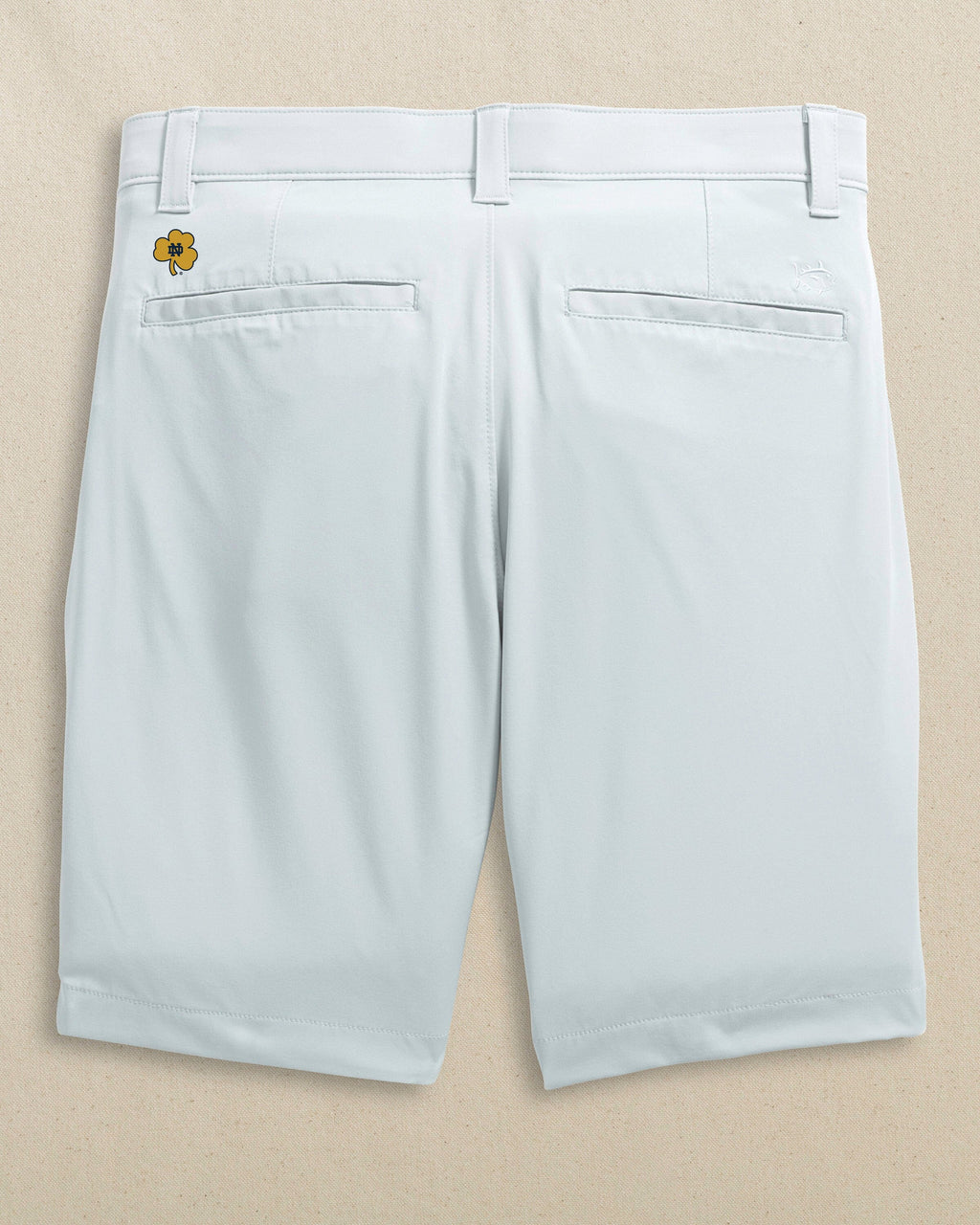 The back view of the Southern Tide Notre Dame Fighting Irish brrr°®-die 8" Performance Short by Southern Tide - Seagull Grey